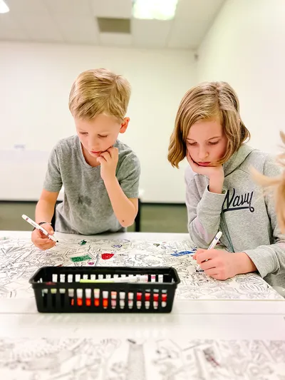 Children working together at a table in The Discovery Studio